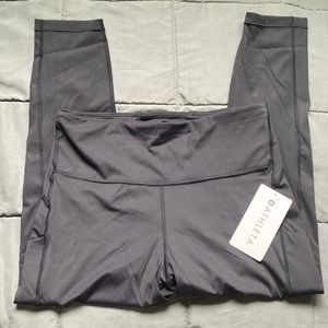 NWT Athleta ultimate stash pocket 7/8 tight black 1x